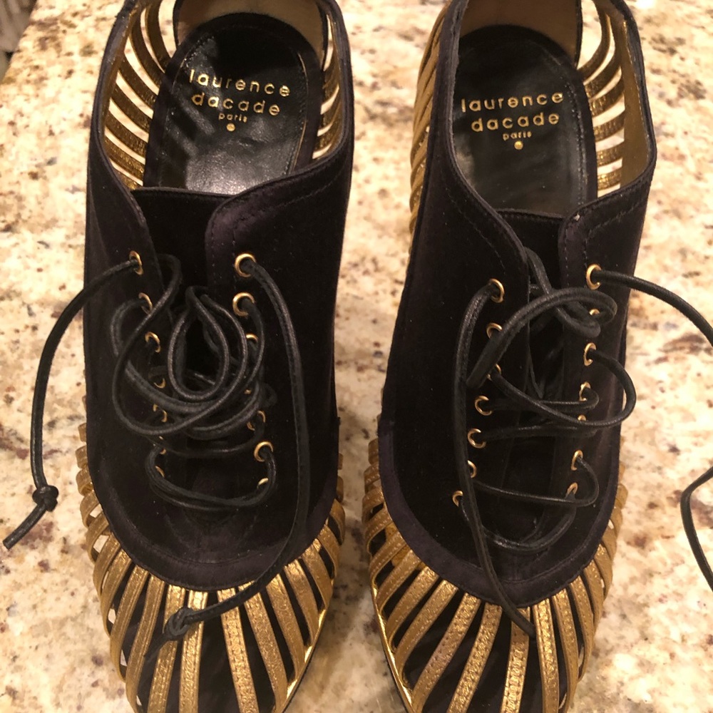 Black and gold boots